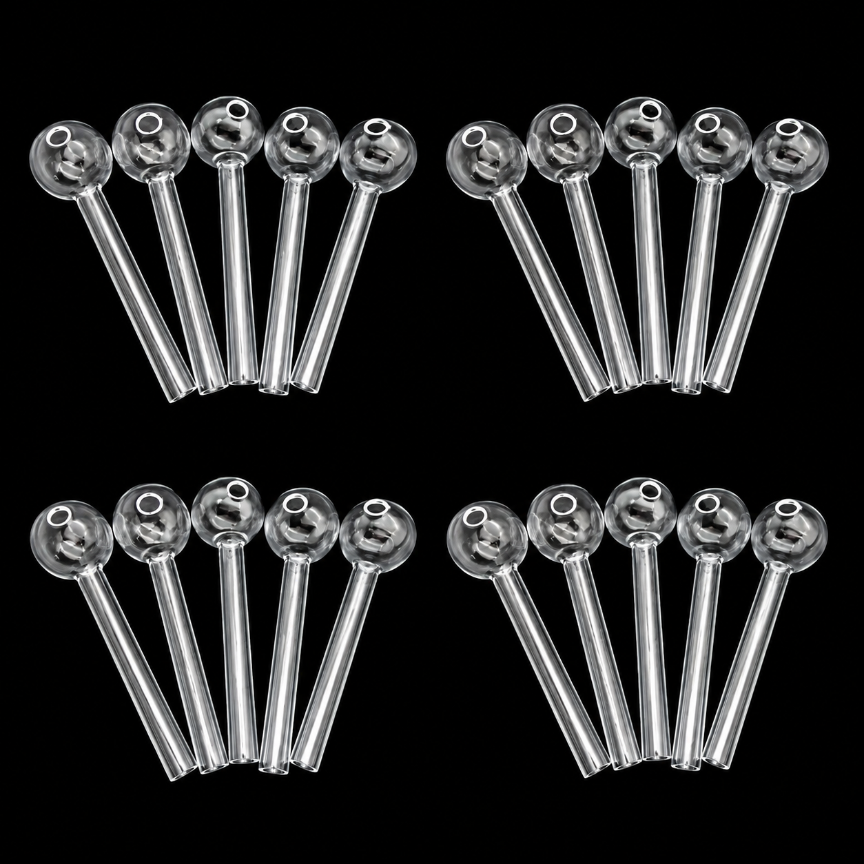 Set of clear glass pipes with metal stems on a black background