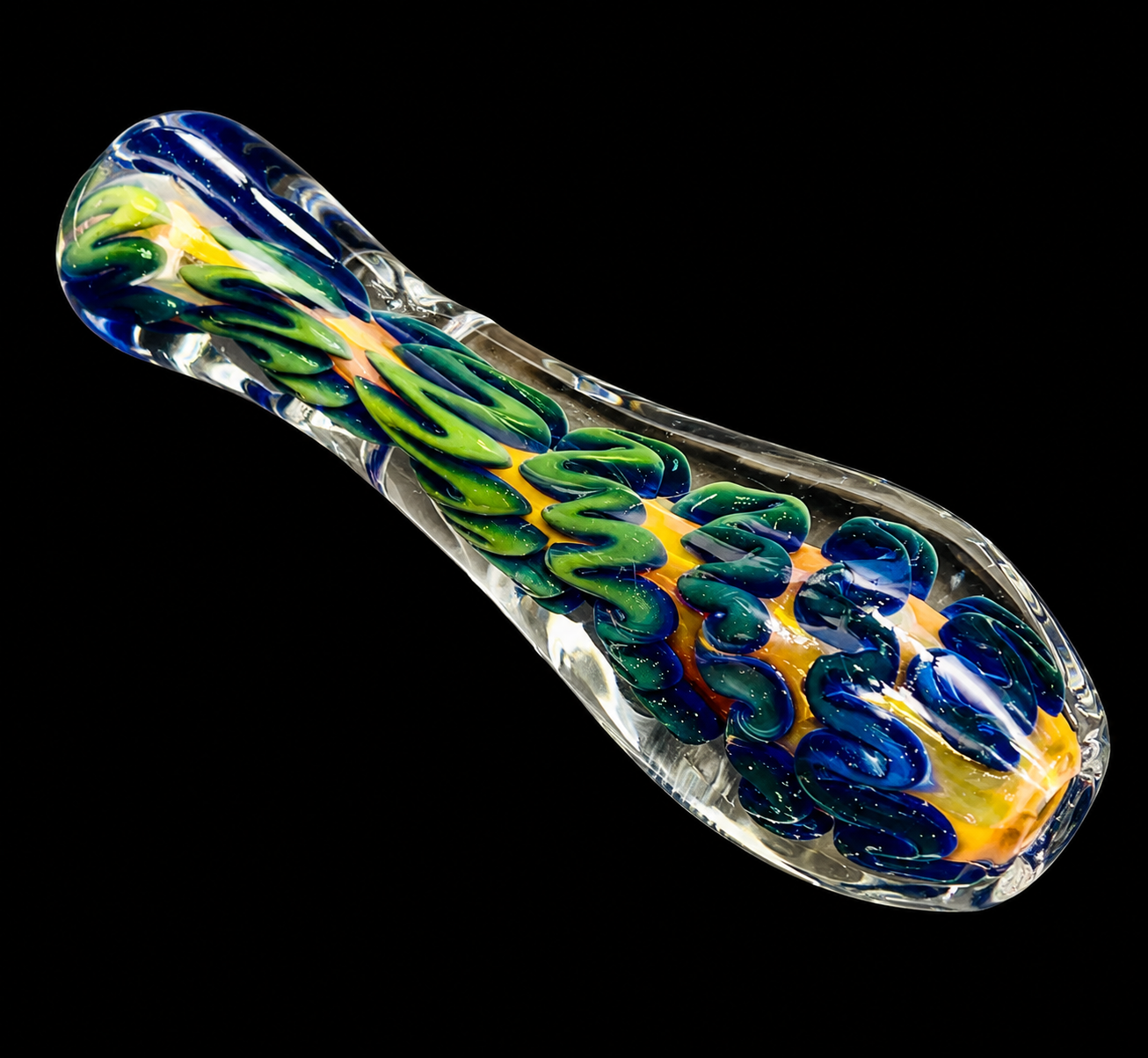 Colorful glass pipe with wavy patterns on a black background