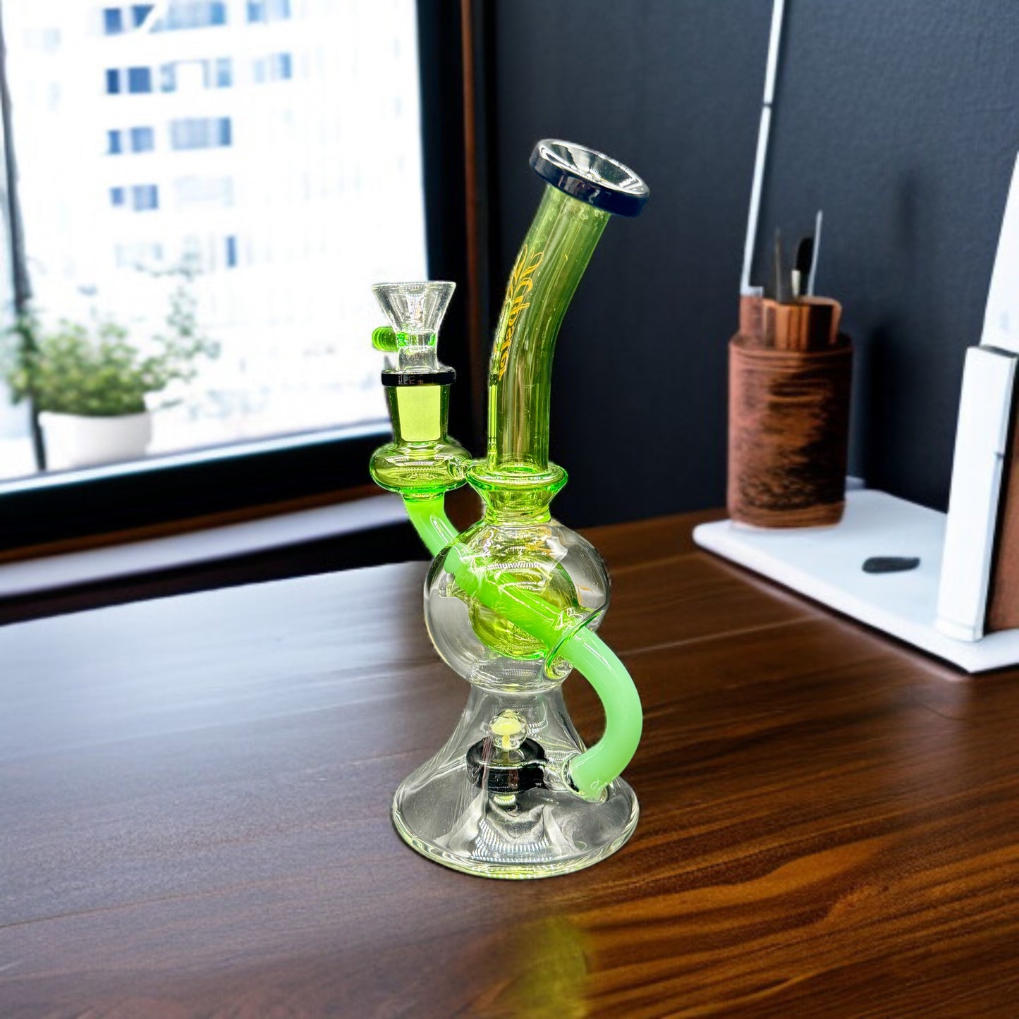 Glass smoking device on a wooden surface with a window in the background