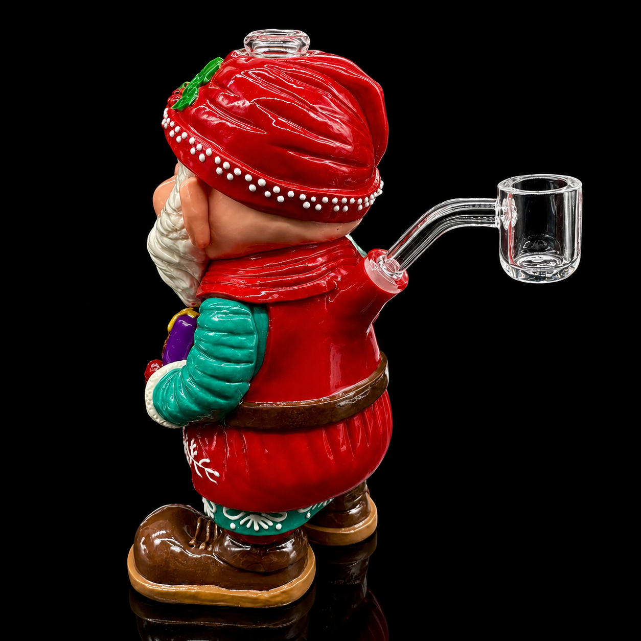 Gnome figurine with a red hat and coat holding a glass pipe on a black background