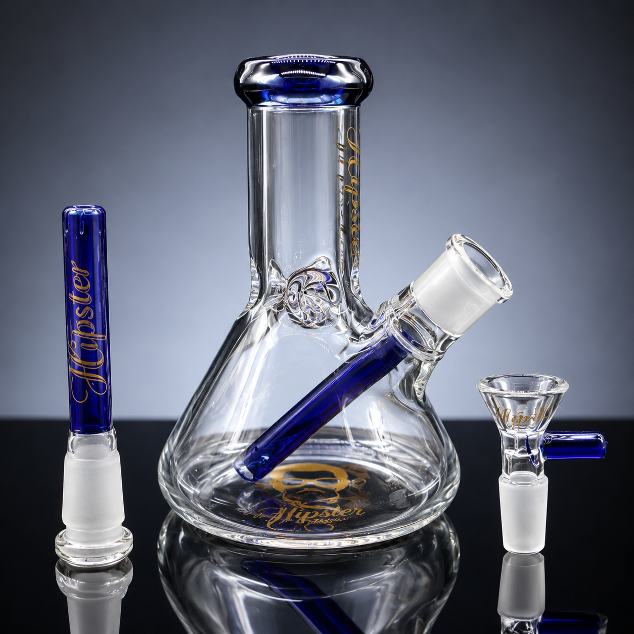 Glass smoking apparatus with blue accents on a reflective surface