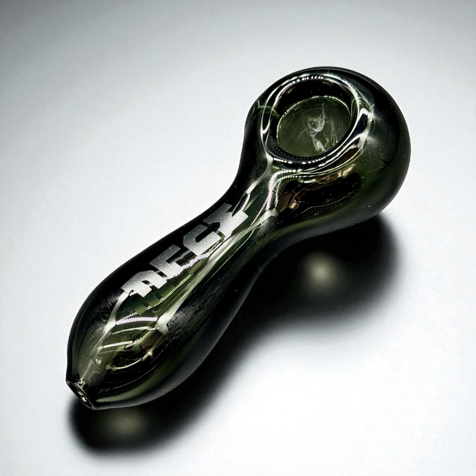 Glass pipe with 'AEC' branding on a white background