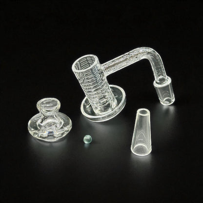 Clear quartz banger  accessory with multiple components on a black background