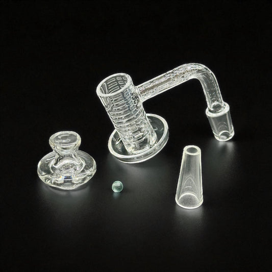 Clear quartz banger  accessory with multiple components on a black background