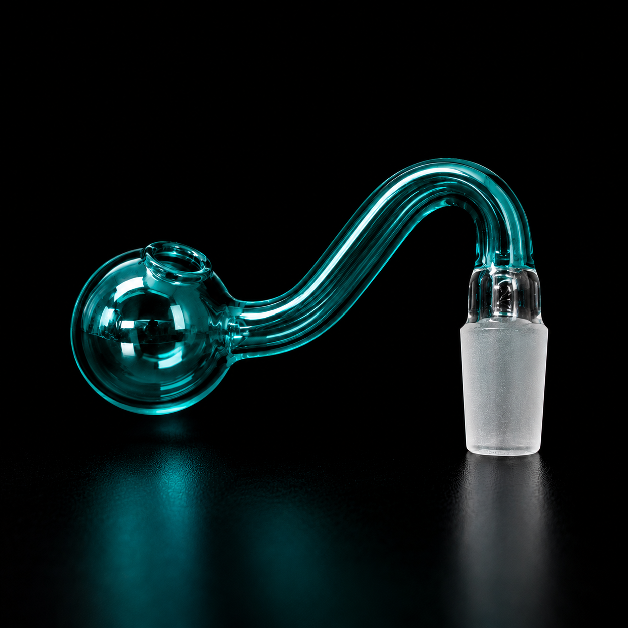 Glass smoking pipe with a white base on a black background
