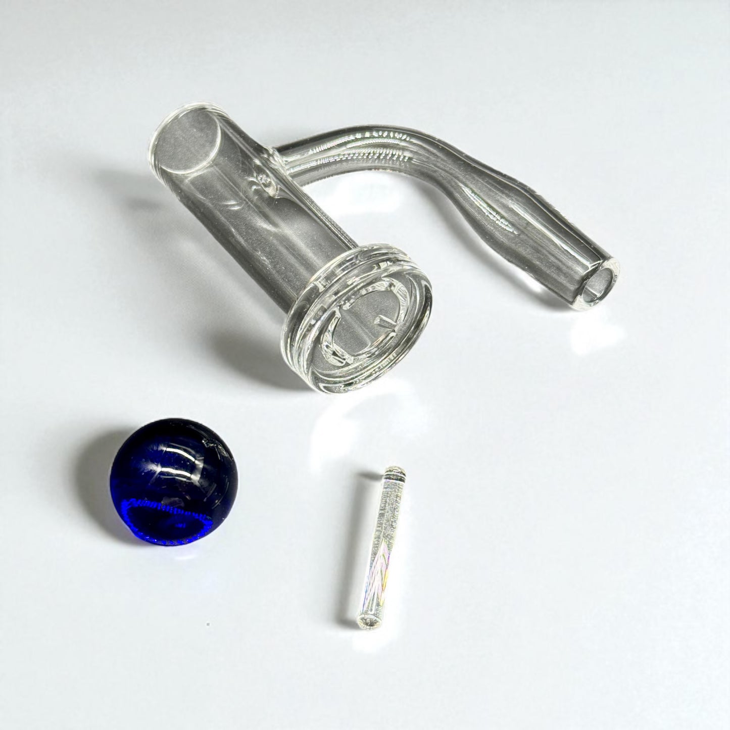 Glass smoking apparatus with a blue accent on a white background