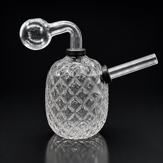 Glass pineapple-shaped smoking device with a black background