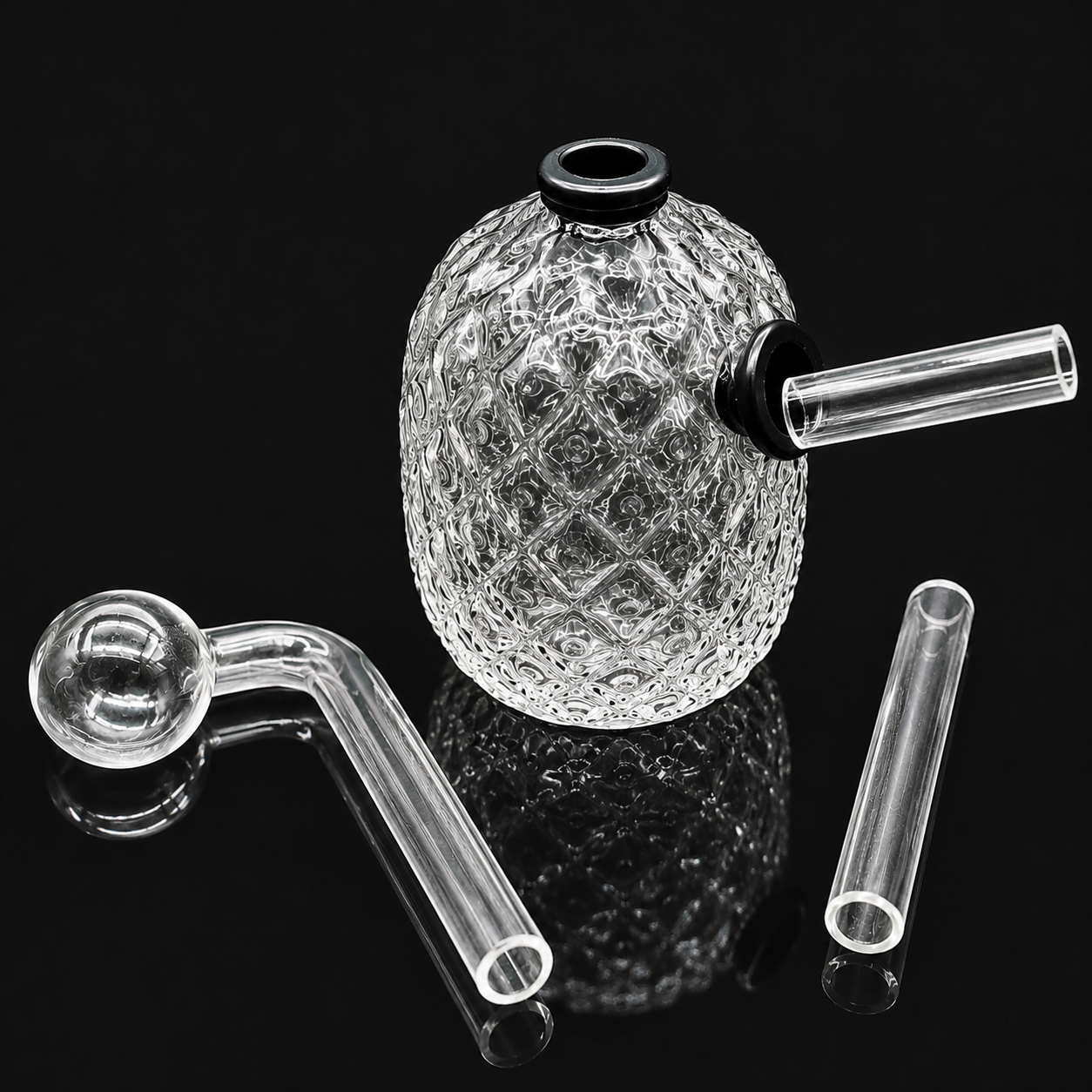 Glass smoking device with textured base and clear components on a black background