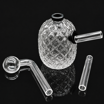 Glass smoking device with textured base and clear components on a black background