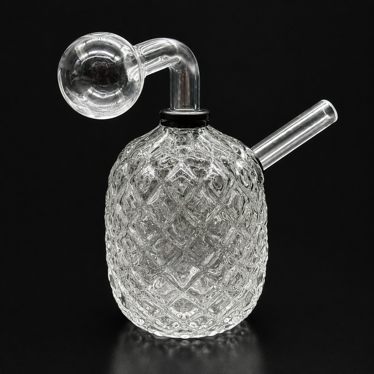 Glass smoking device with a textured base on a black background