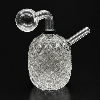 Glass smoking device with a textured base on a black background