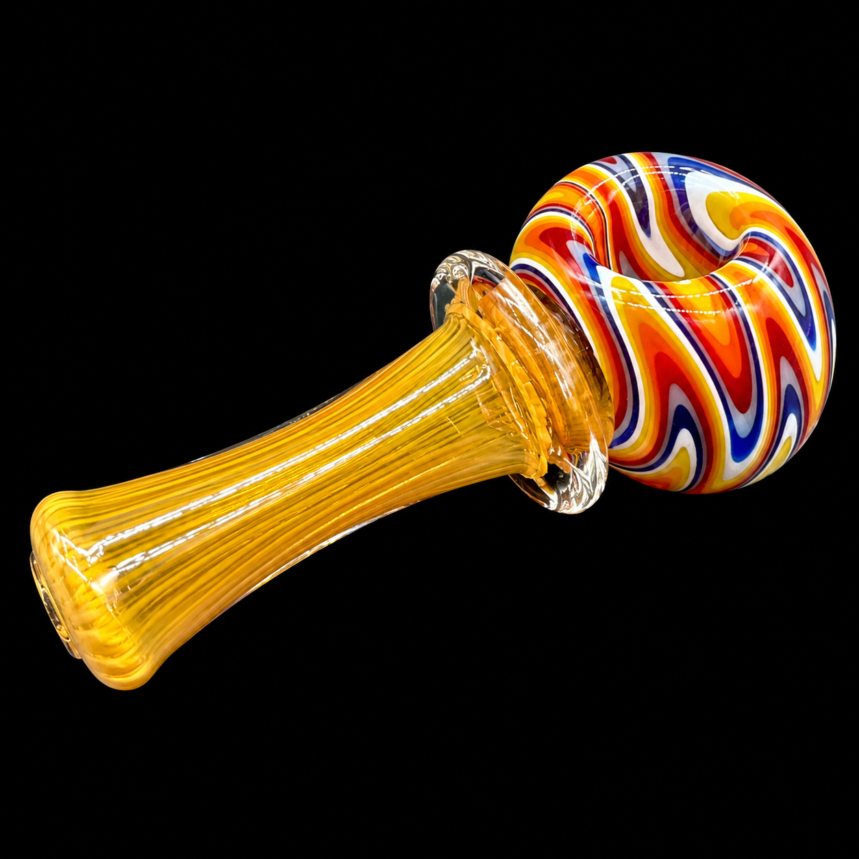 Glass smoking pipe with yellow stem and multicolored swirl bowl on a black background