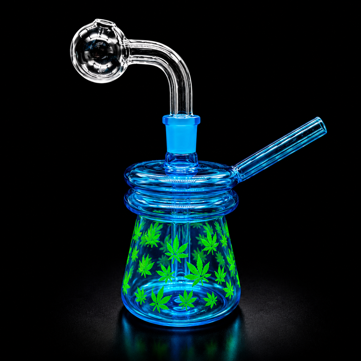 Glass smoking device with cannabis leaf pattern on a black background