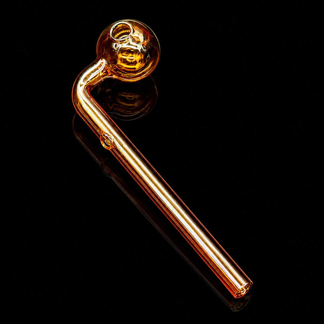 Glass pipe with a bulbous bowl on a black background