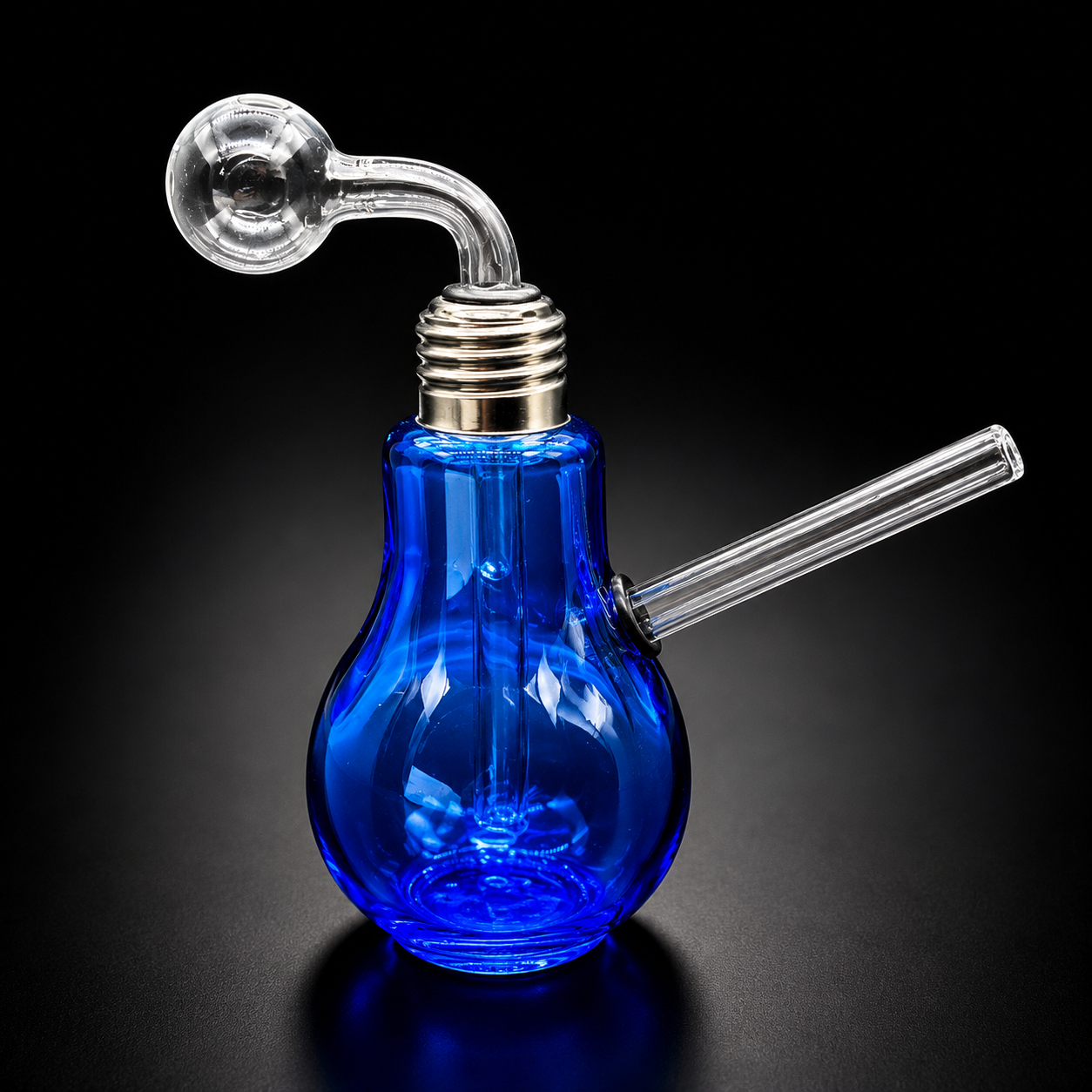 Blue glass light bulb with smoking apparatus on a black background