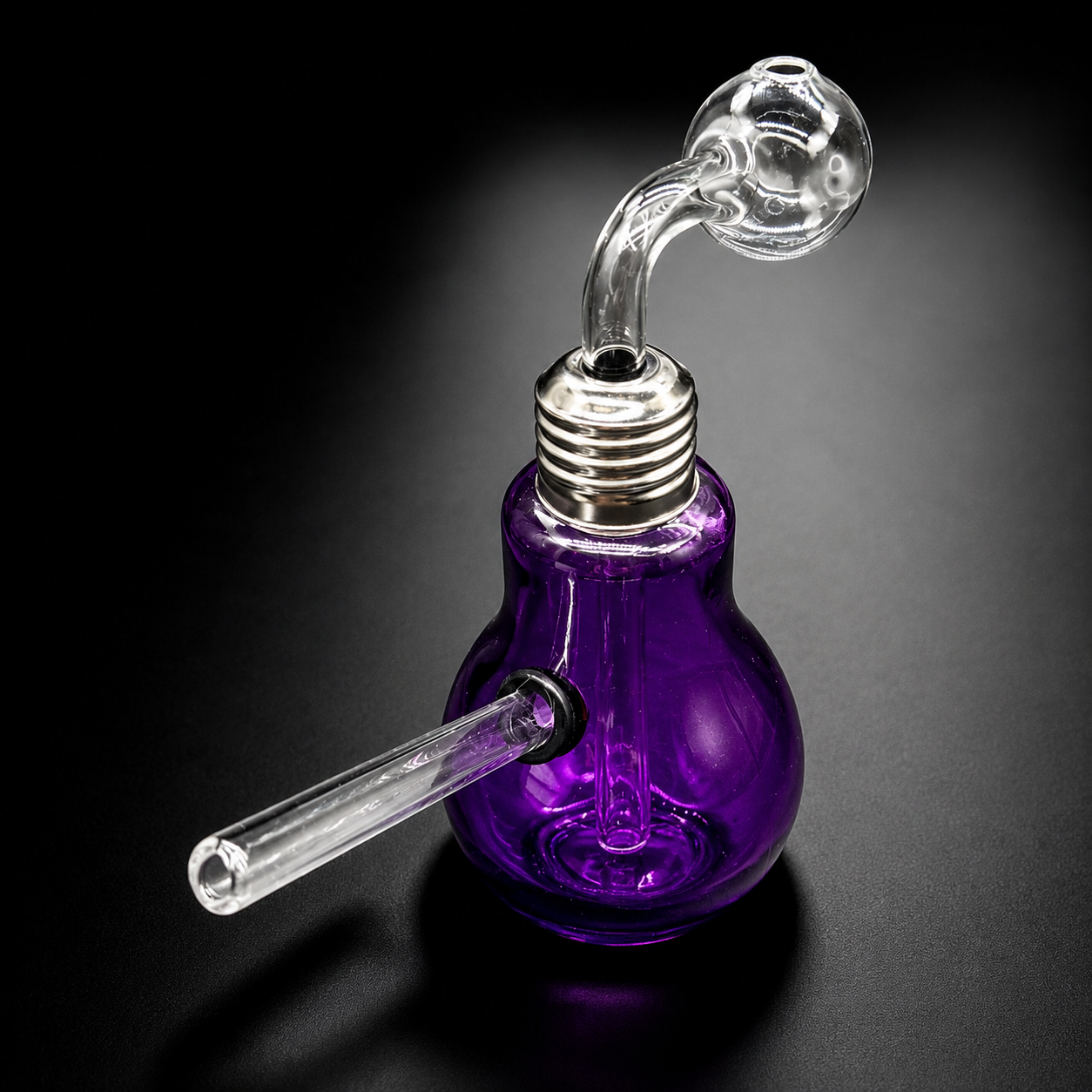 Purple glass light bulb with a smoking apparatus on a black background