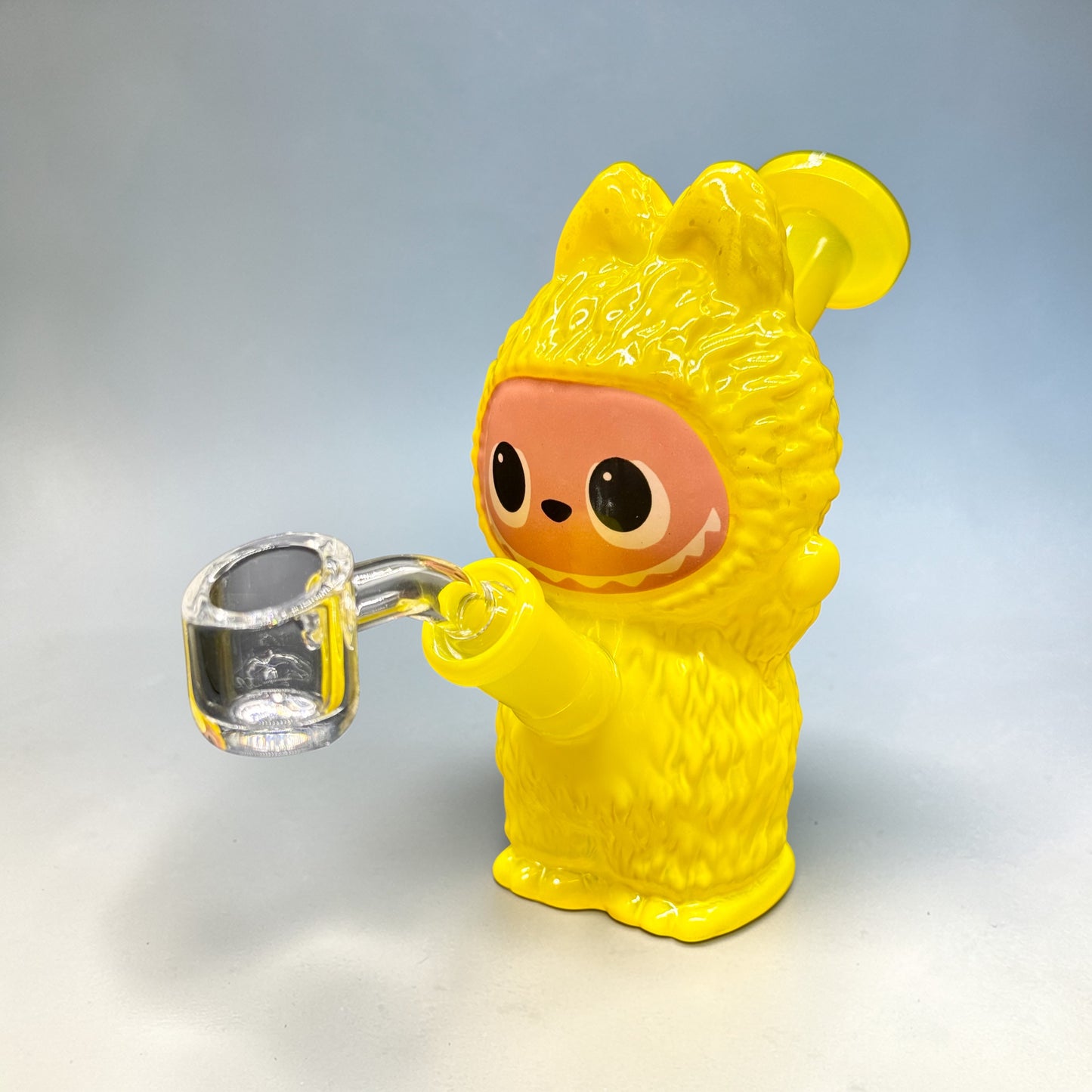Yellow character holding a clear glass mug on a light gray background