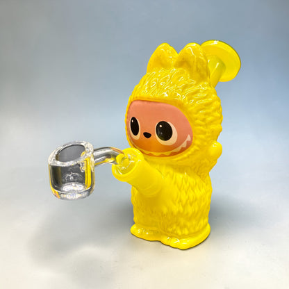 Yellow character holding a clear glass mug on a light gray background