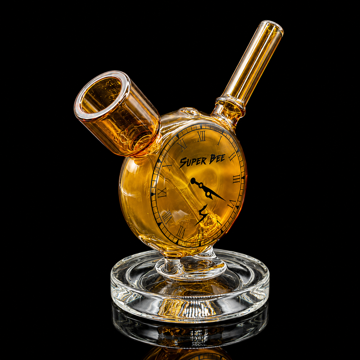Glass smoking device with 'Super Bee' branding on a black background