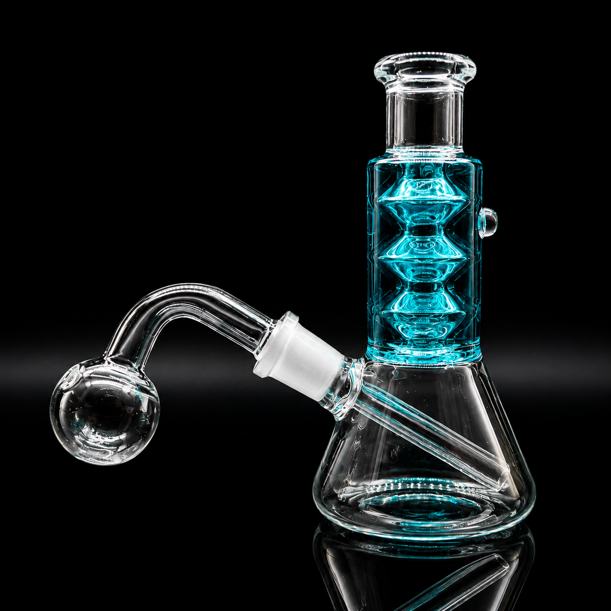 A clear glass beaker-style water pipe with a bright turquoise blue textured neck and a clear glass bowl on a black reflective background.