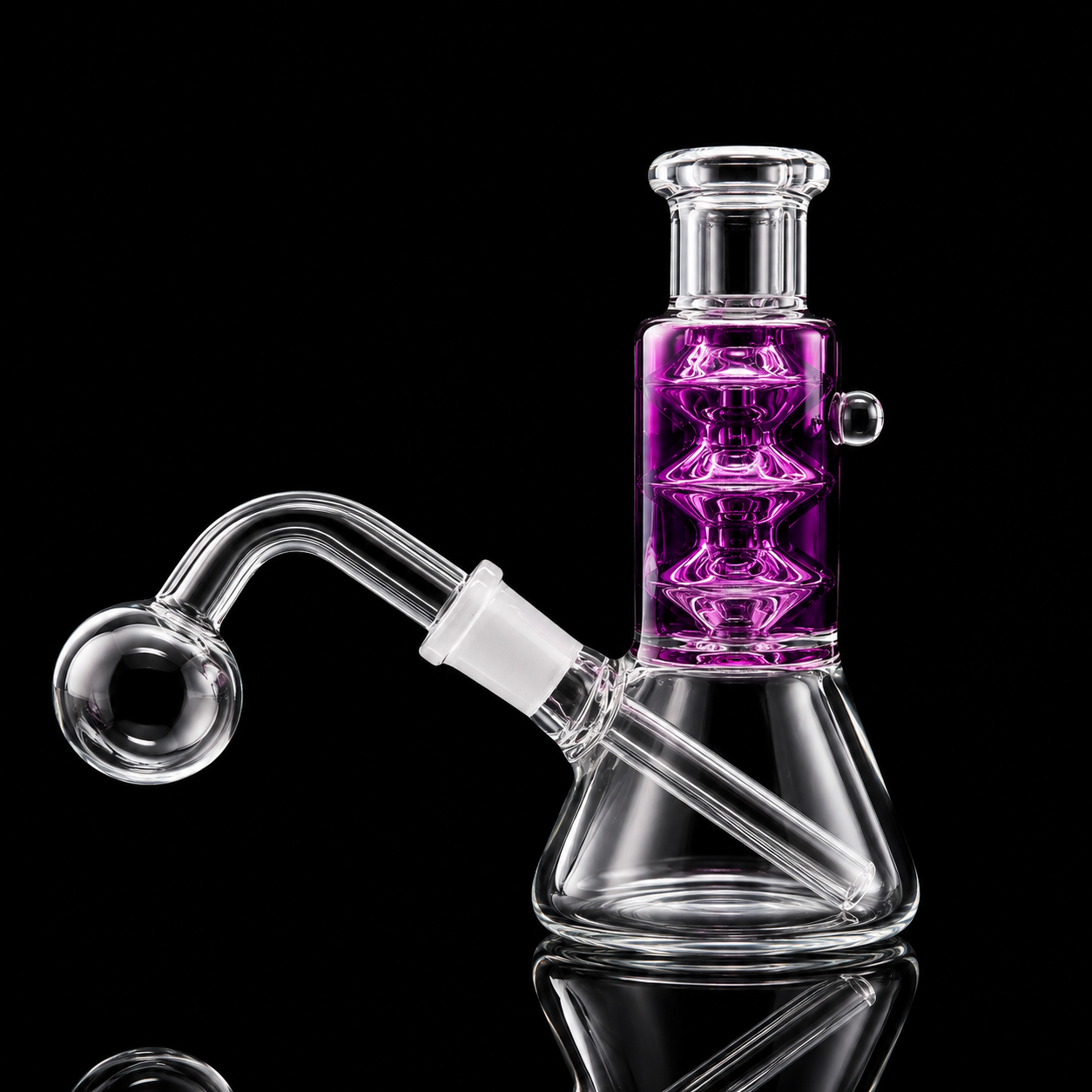 A clear glass water pipe with a purple glass chamber and a curved glass bowl, shown on a reflective black background.