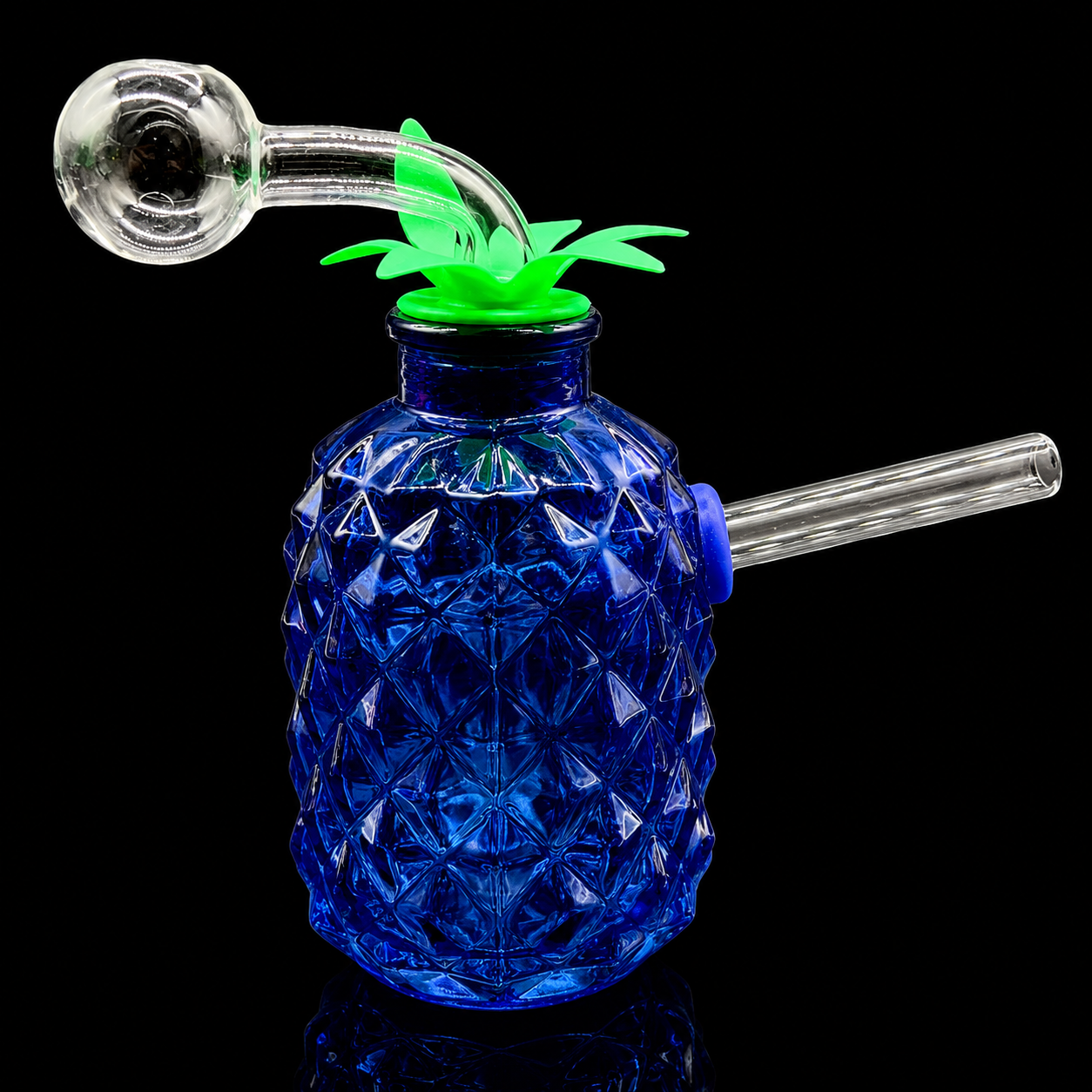 Blue glass pineapple-shaped smoking device with green top on a black background