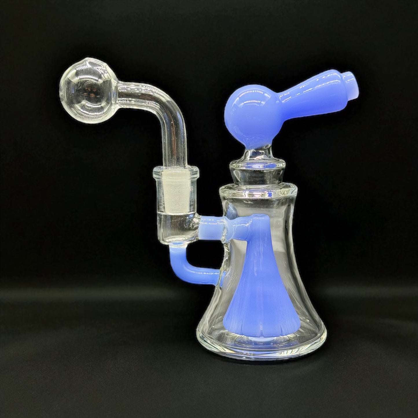 6-inch blue borosilicate glass oil burner water pipe with 14mm slide on black background.