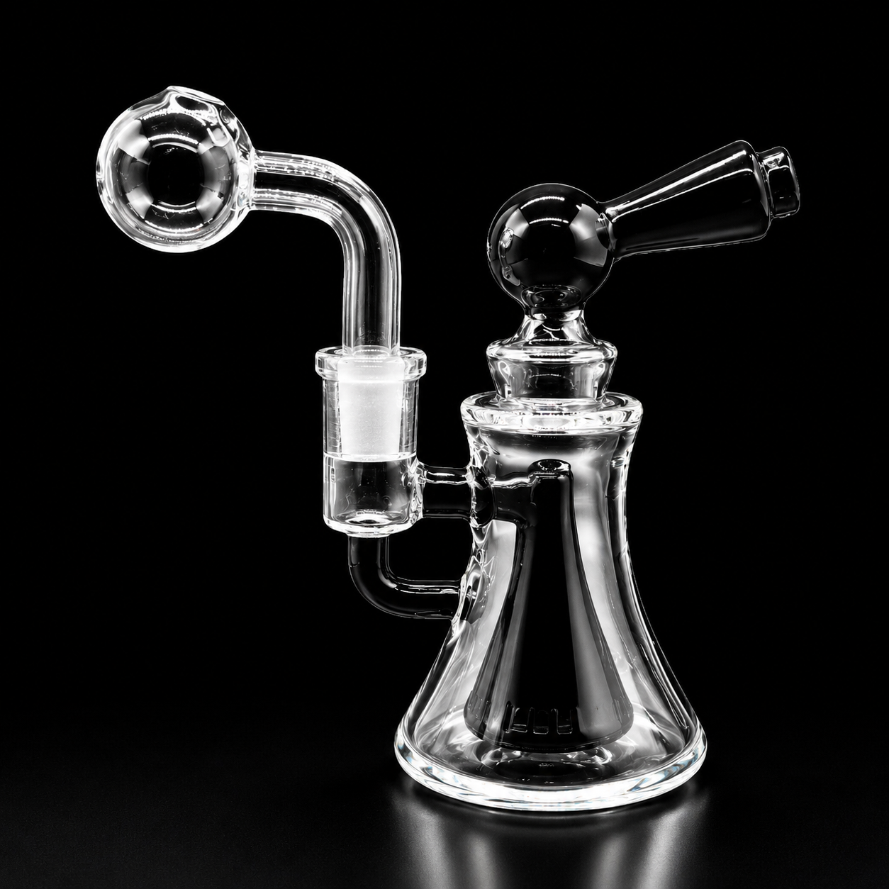 Clear glass smoking device with two outlets on a black background