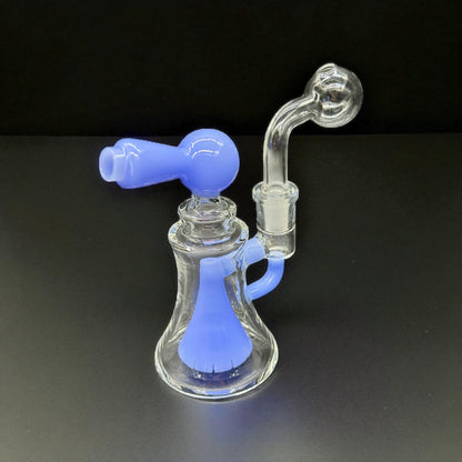 Glass smoking device with blue accents on a black background