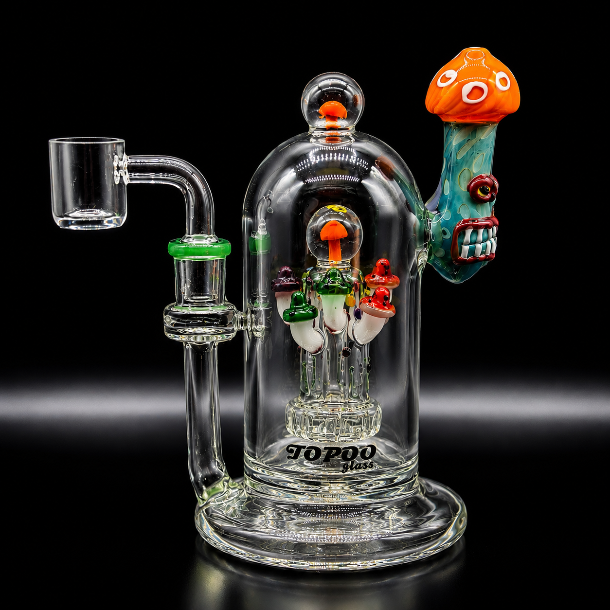 Glass smoking device with colorful mushroom design on a black background