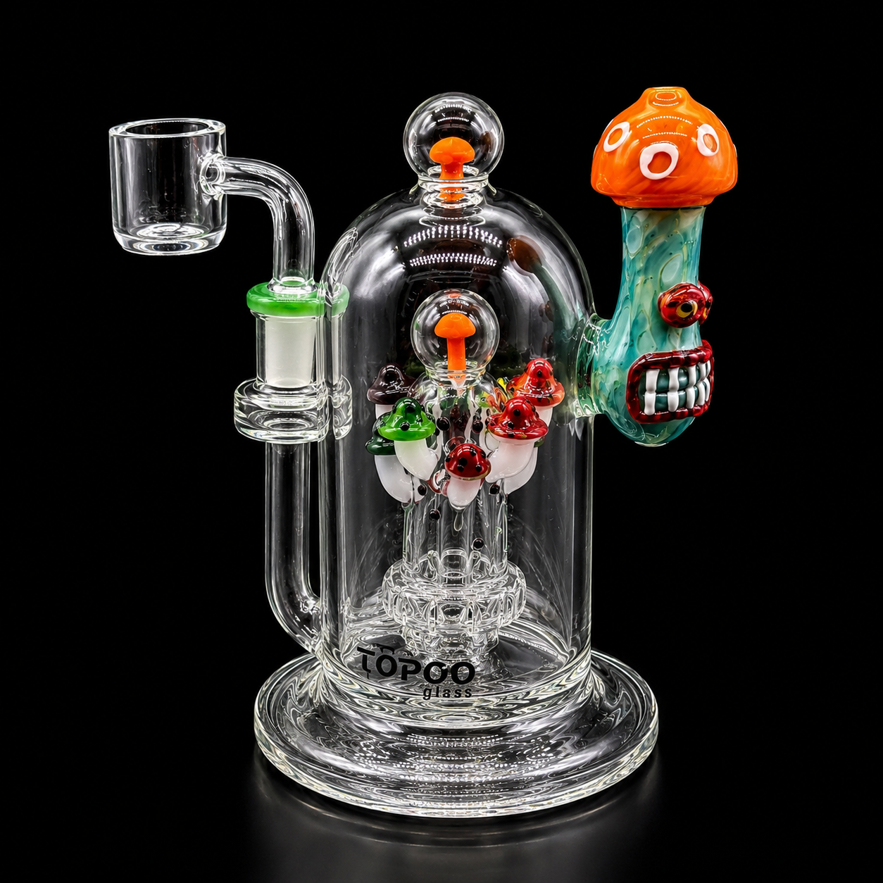 Colorful glass smoking device with cartoonish face on a black background