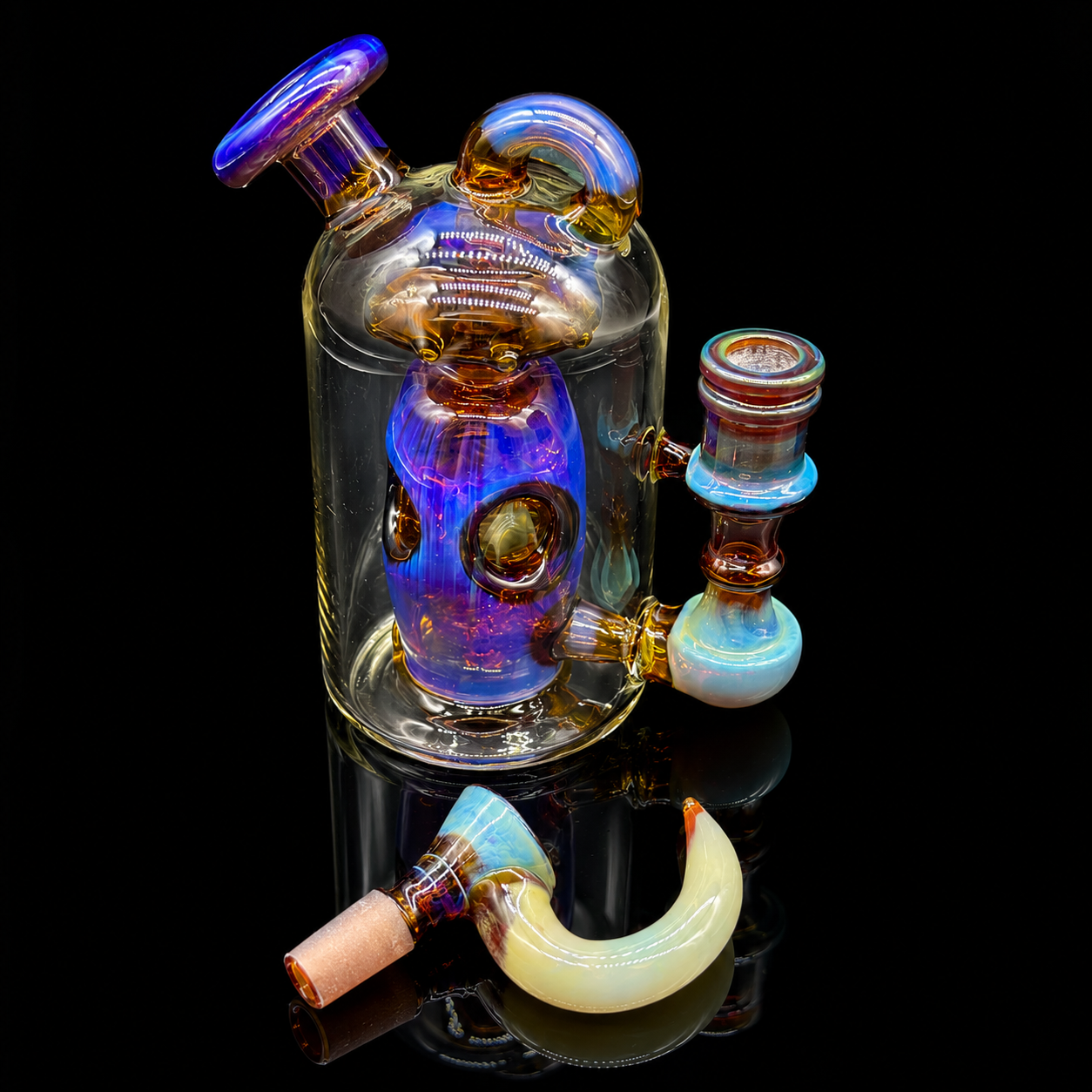 Glass smoking device with colorful components on a black background