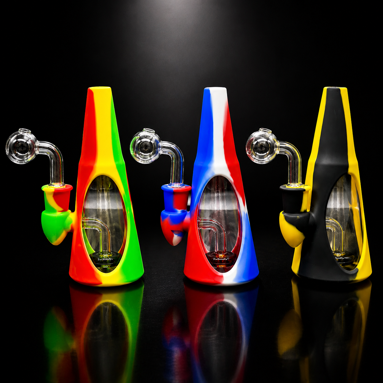 Three colorful glass smoking devices on a black background