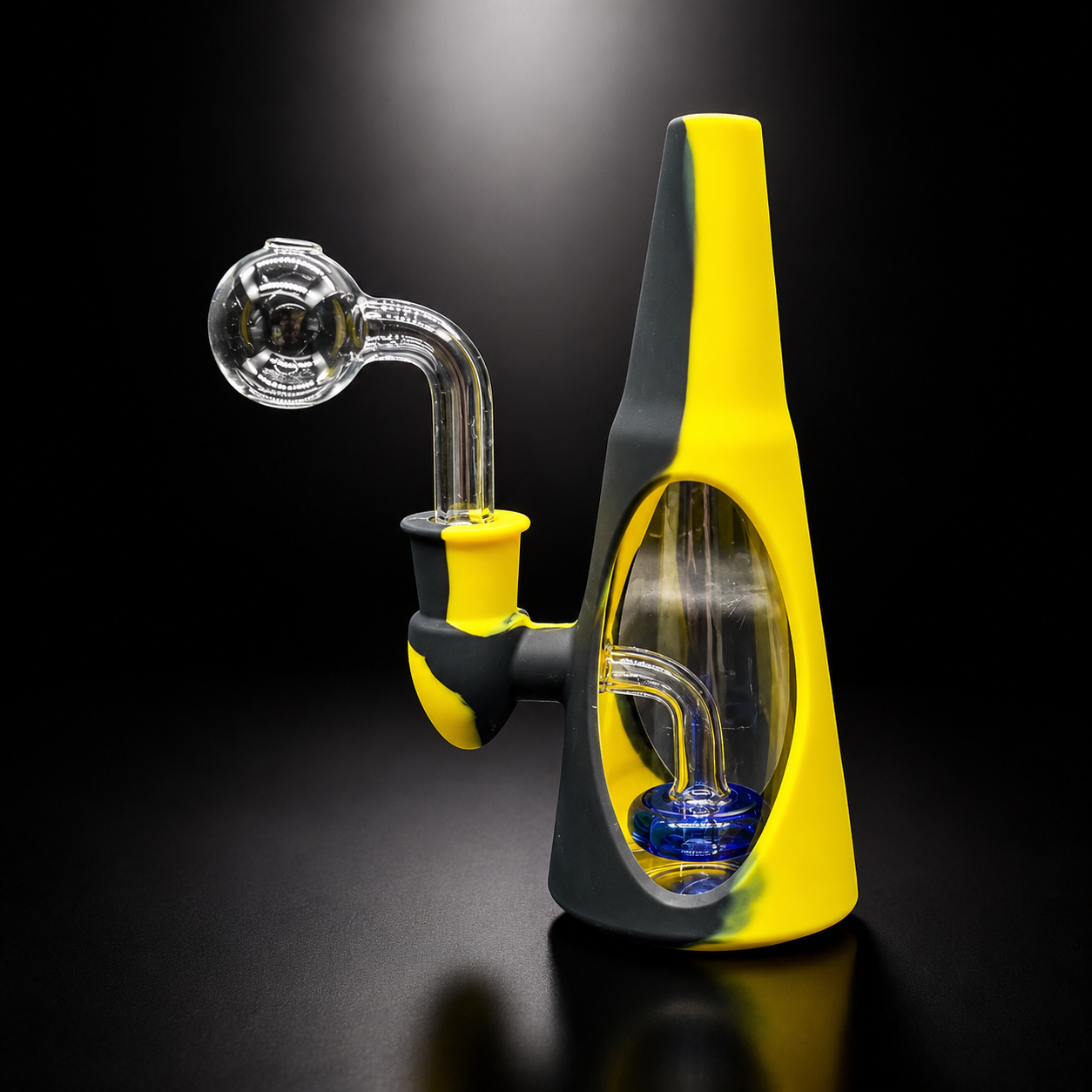 Yellow and black glass water pipe on a dark background