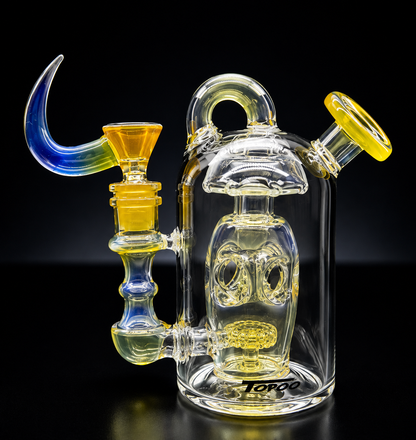 Glass smoking device with colorful accents on a black background