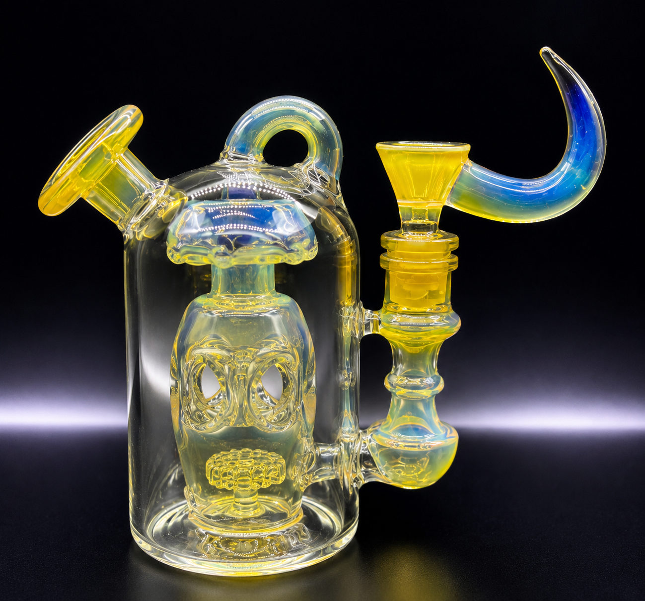 Glass smoking device with yellow and blue accents on a black background