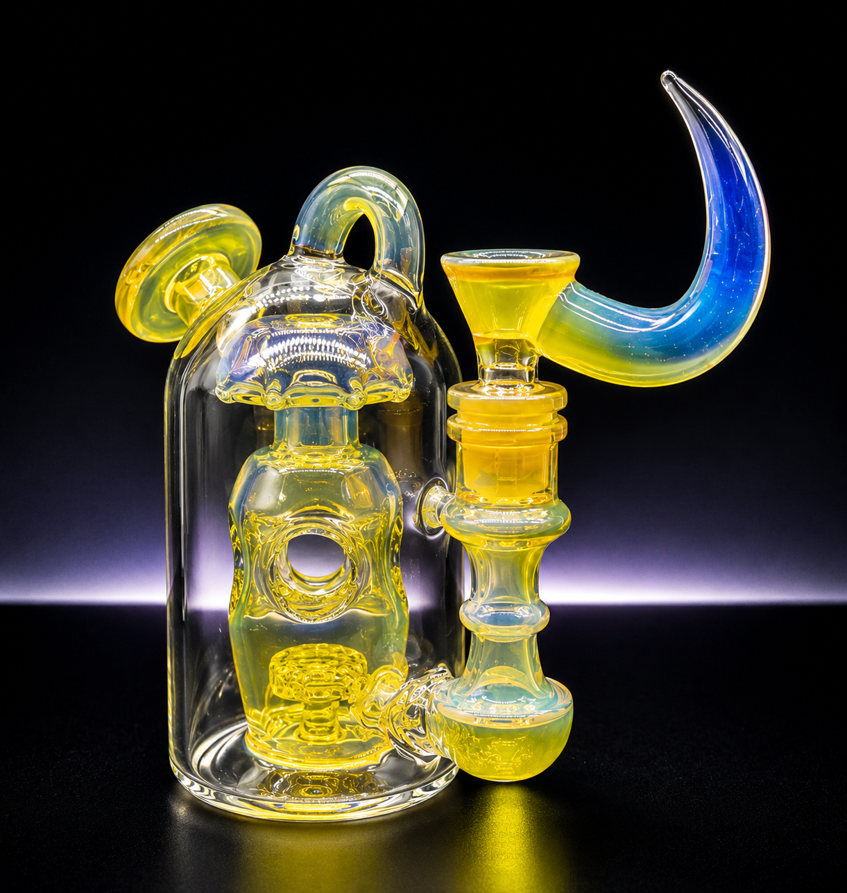 Glass smoking device with yellow and blue colors on a black background