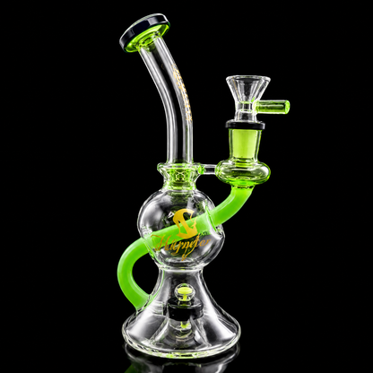 Glass water pipe with green accents on a black background