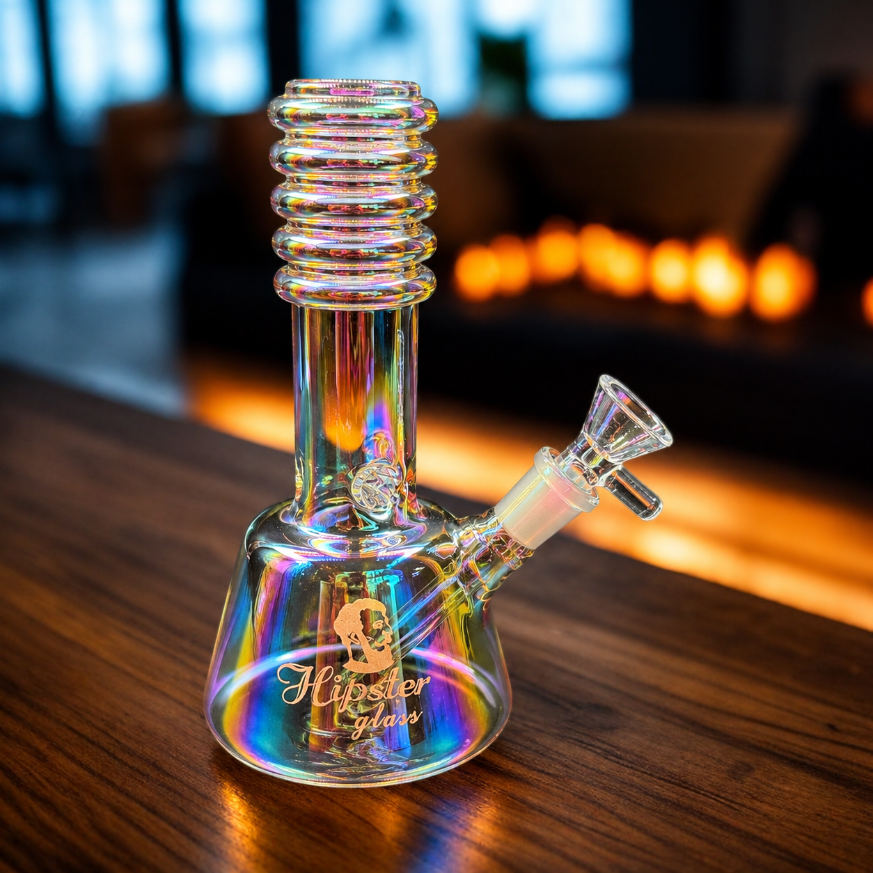 Glass smoking device with rainbow gradient on a wooden surface, blurred background