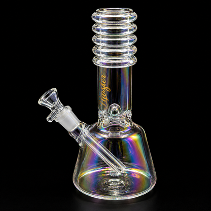 Glass water pipe with rainbow effect on a black background