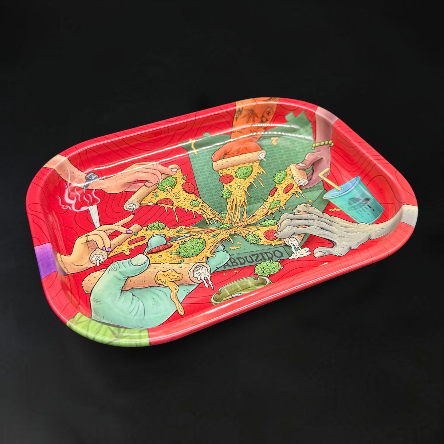 Colorful tray with artistic design of hands and pizza on a black background