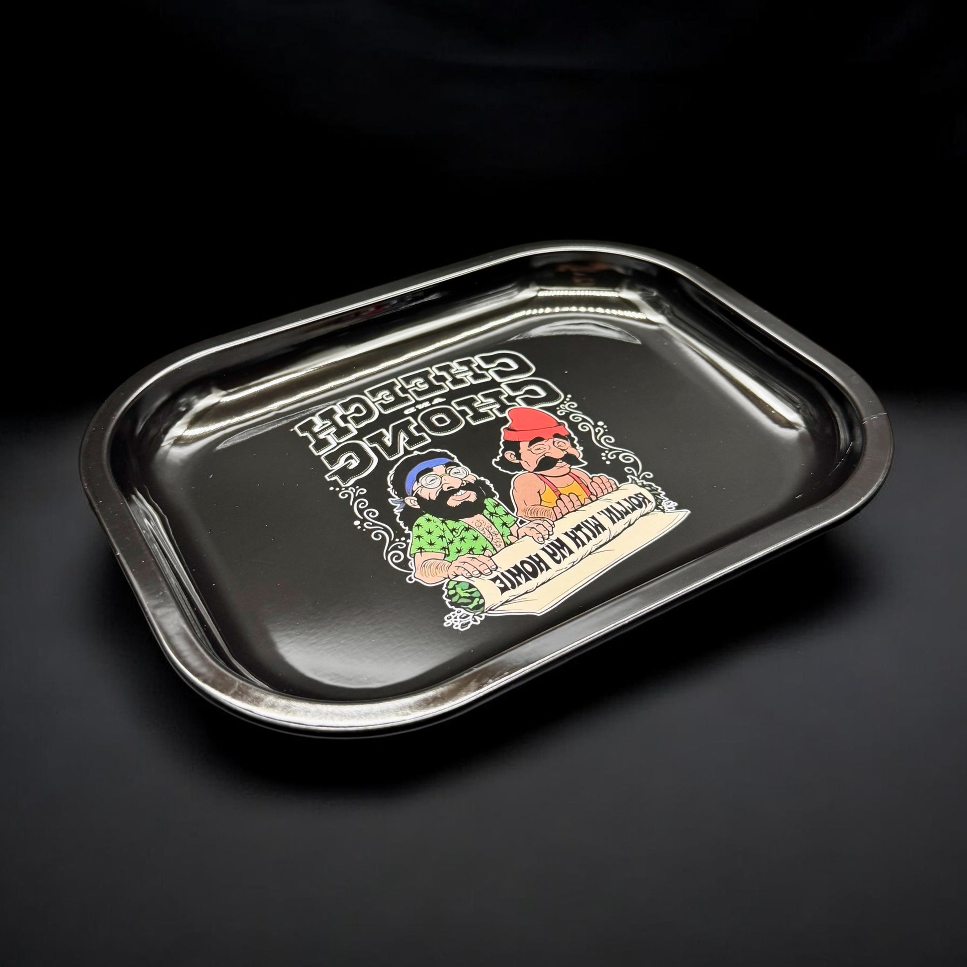 Metallic rolling tray with cartoon characters and text on a black background