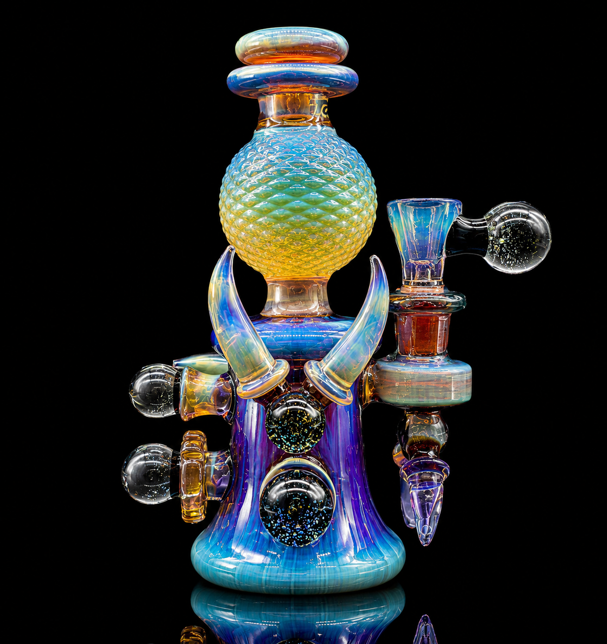 Colorful glass smoking apparatus with blue, yellow, and purple hues on a black background