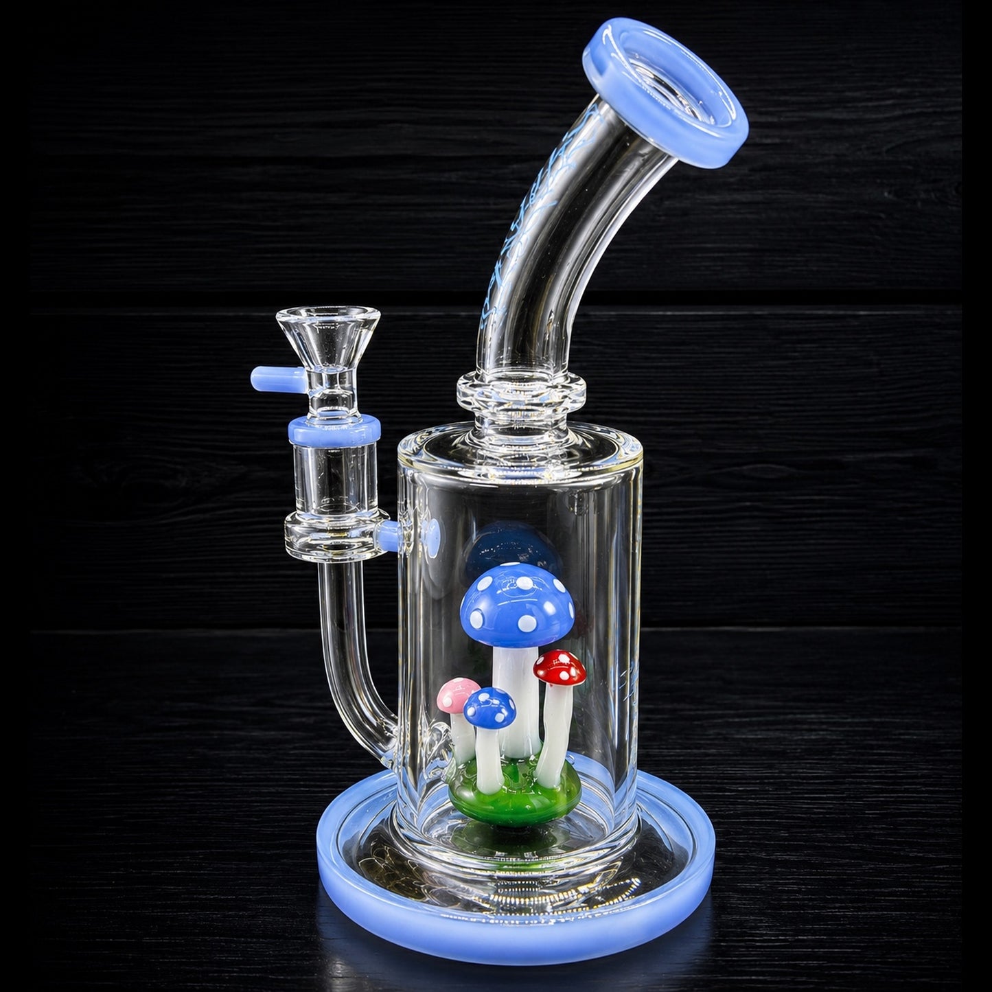 Glass smoking device with mushroom decorations on a dark background