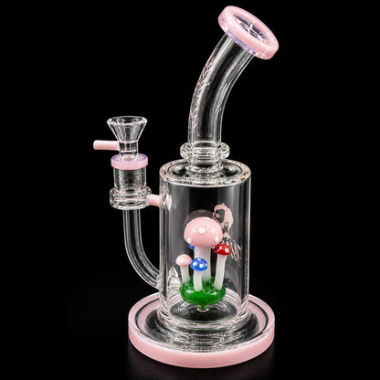 Glass smoking device with mushroom decorations on a black background