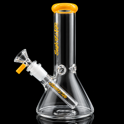 Clear glass water pipe with yellow accents on a black background