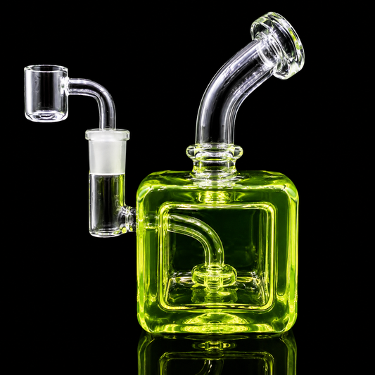 Green glass water pipe with multiple branches on a black background