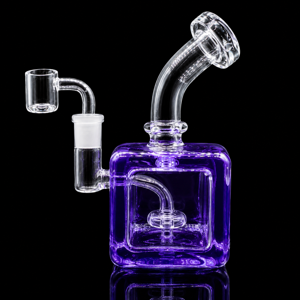 Glass water pipe with purple base on a black background