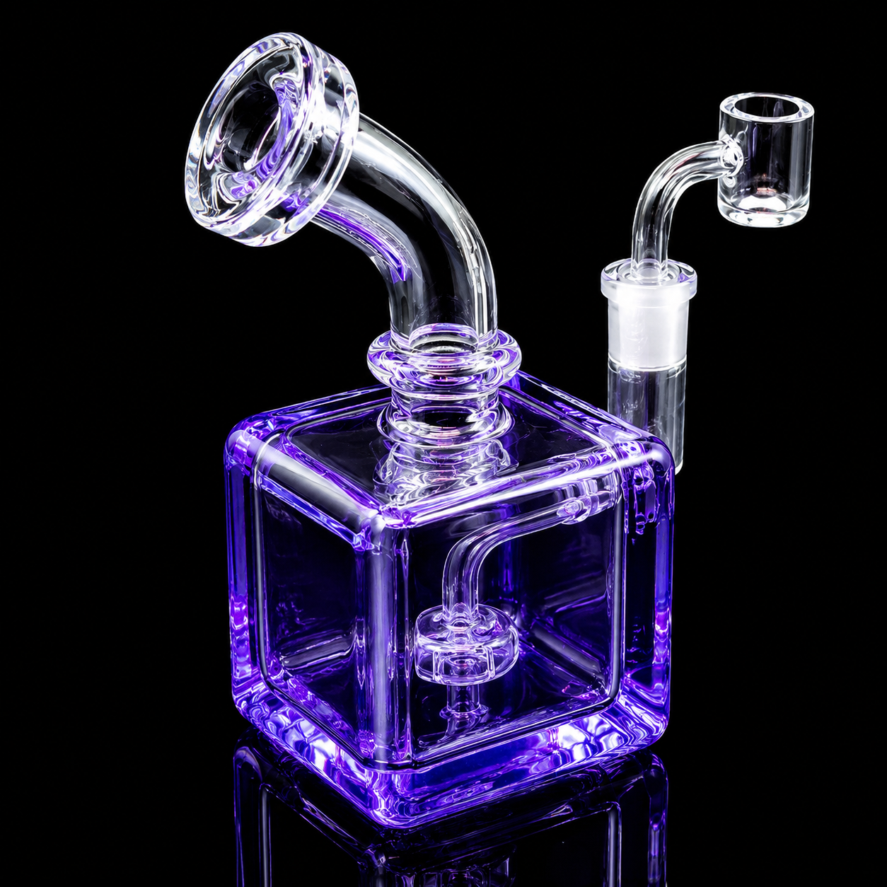 Glass water pipe with purple base on a black background