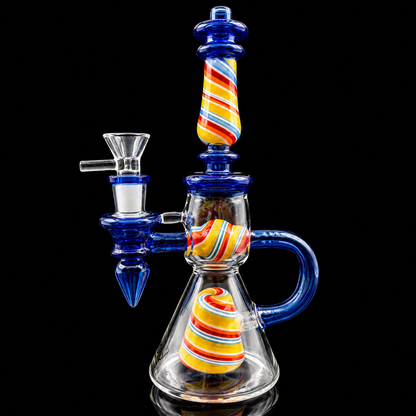 Glass smoking device with colorful striped design on a black background
